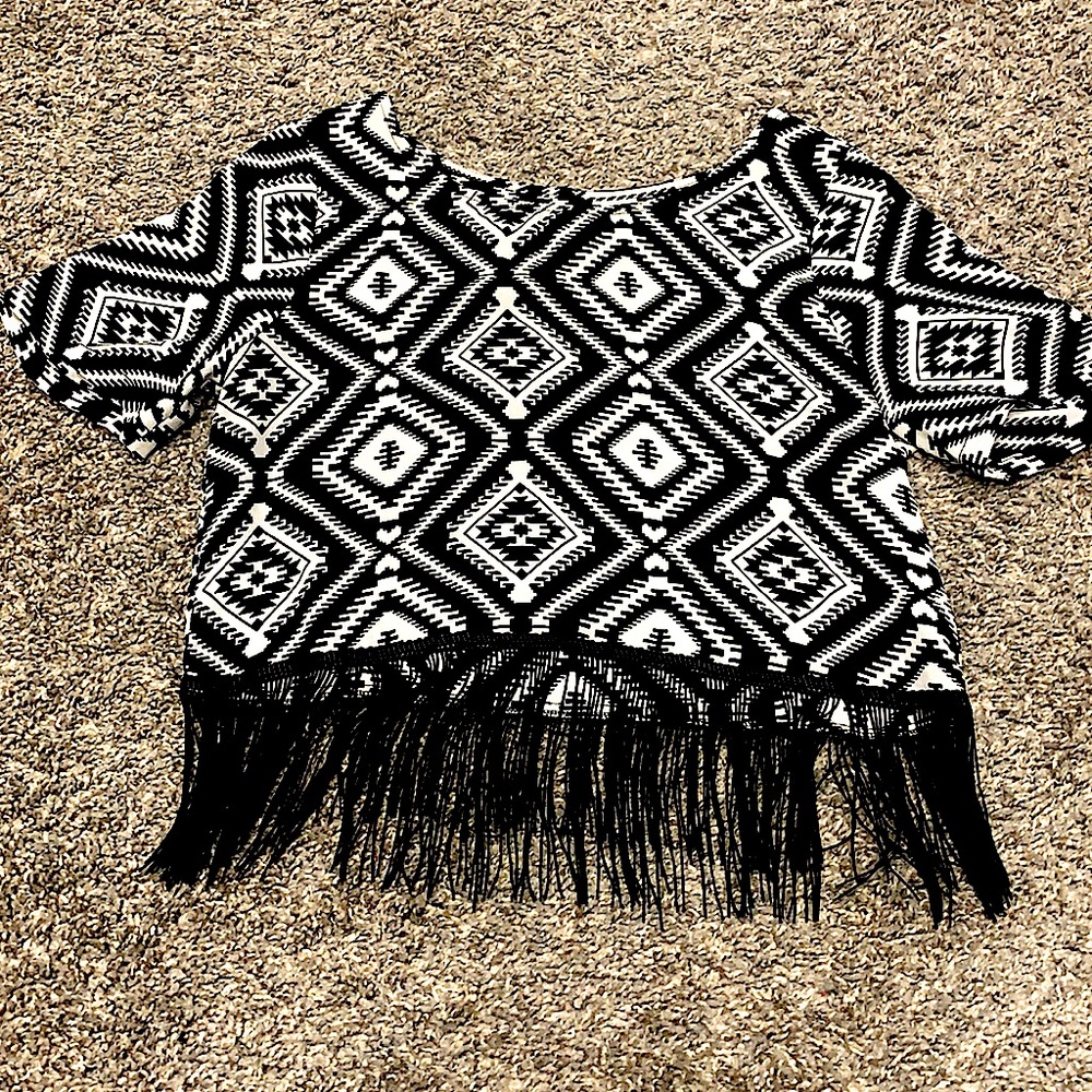 A little black and white frilly top
